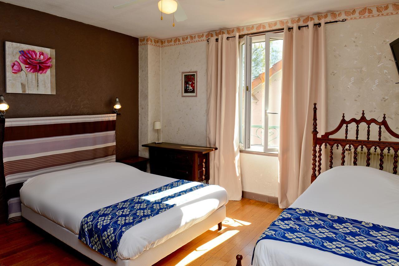 Logis Hostellerie Du Neez Gan Quarto foto